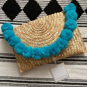 Woven Pom Pom clutch